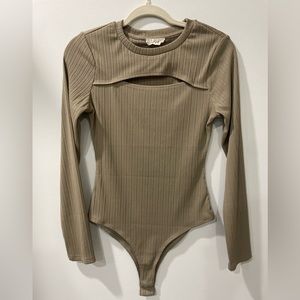 New In Long Sleeve Bodysuit